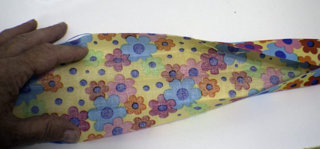 Fold the Fabric in Fours and Press DIY Pacifier Clips