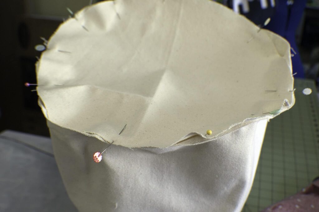 Sew the bottom to the cylinder Sew a drawstring beach bag