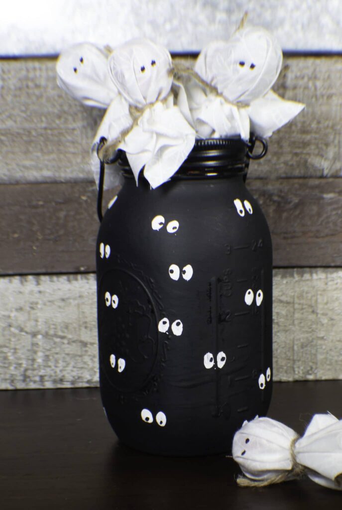 Make a google eye mason jar and ghostly lollipops