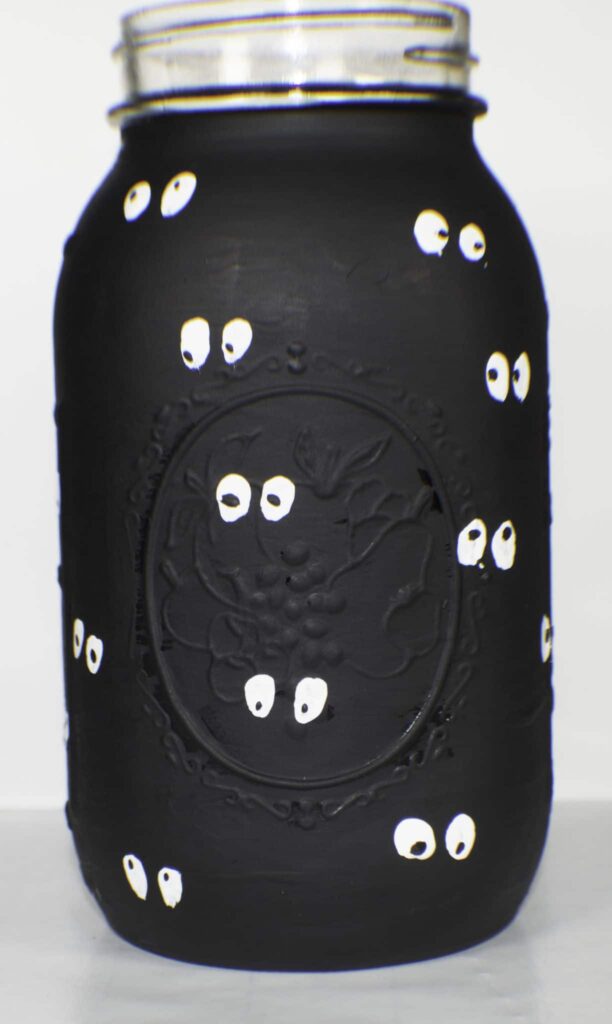 Make a google eye mason jar and ghostly lollipops